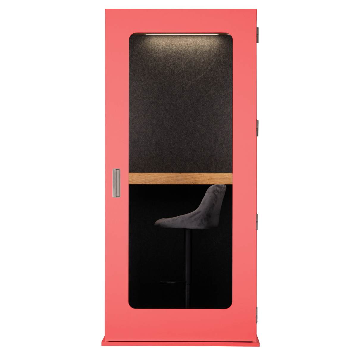 A coral pink soundproof booth with a large textured black window, a light wood divider, and a built-in gray lounge chair, shown on a solid white background.